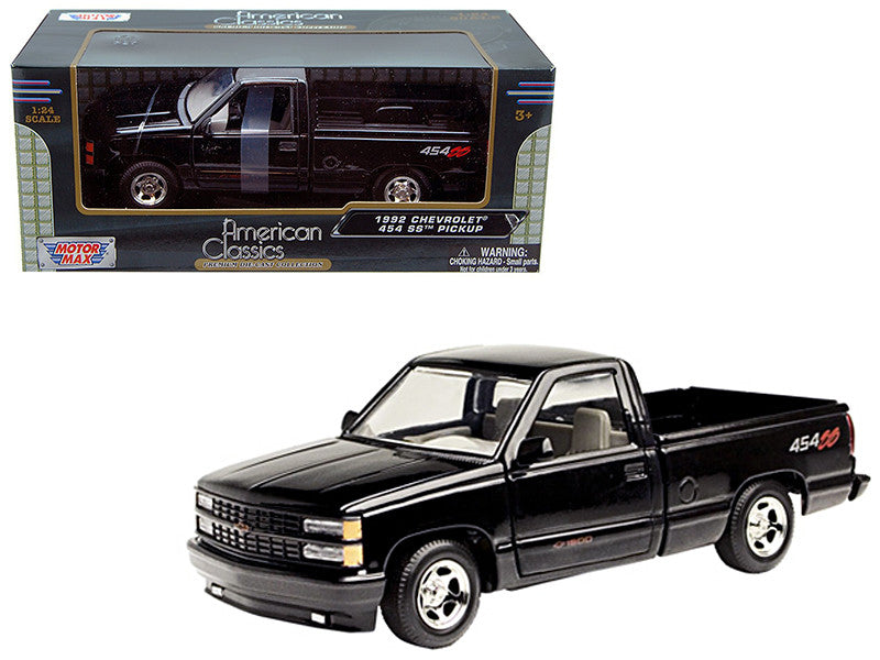 Motormax 1992 Chevrolet 454 SS Pickup 1/24 diecast model, black, opening hood, doors and tailgate, collector car.