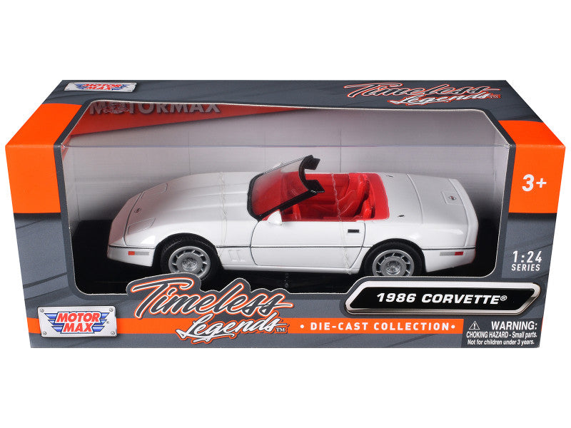 1986 Corvette C4 Convertible 1/24 white diecast car by Motormax with red interior, steerable wheels, and opening doors.