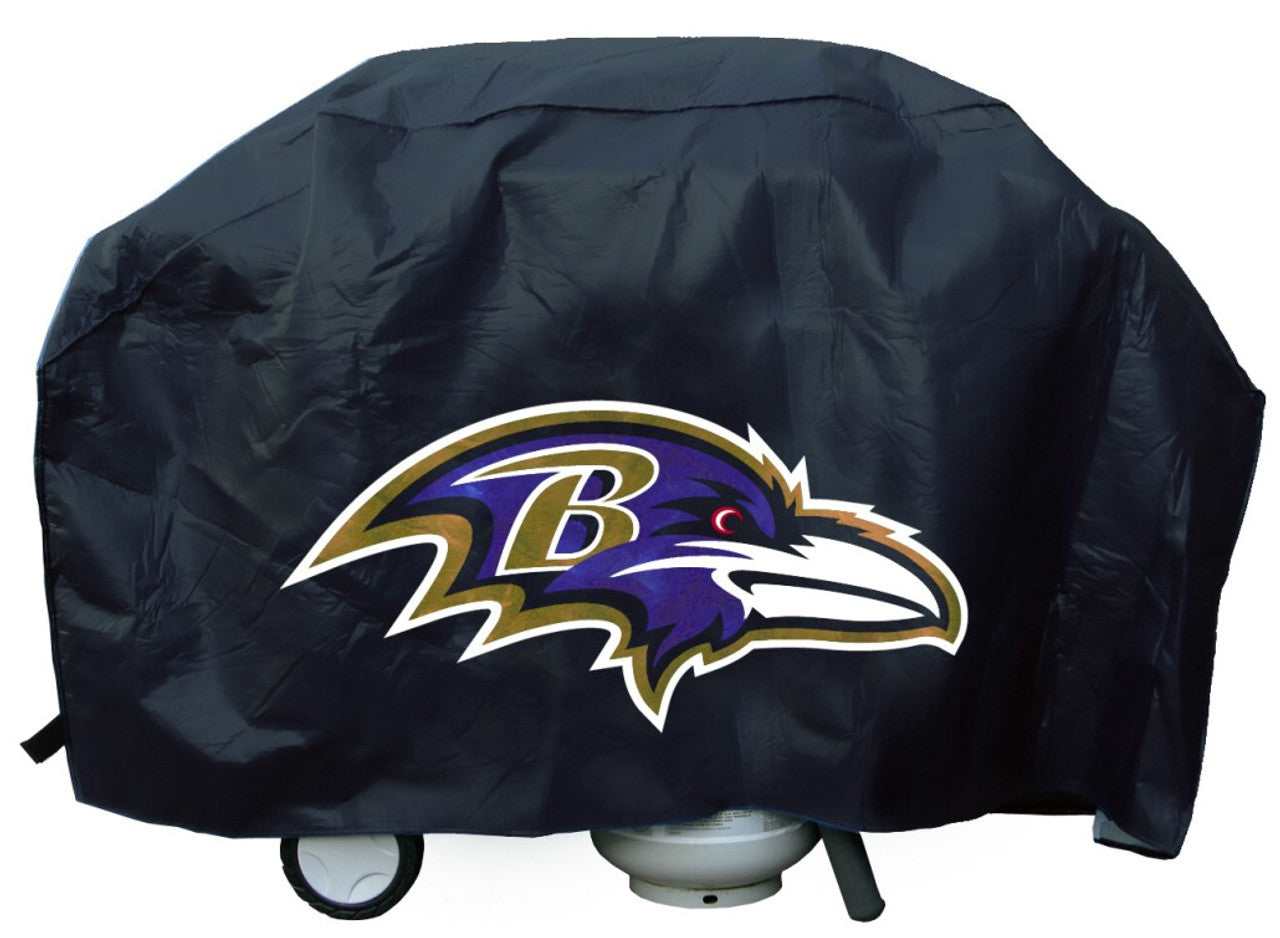 Seattle Seahawks Deluxe Vinyl Grill Cover with straps, felt lining, and bold team logo. Fits most standard grills.
