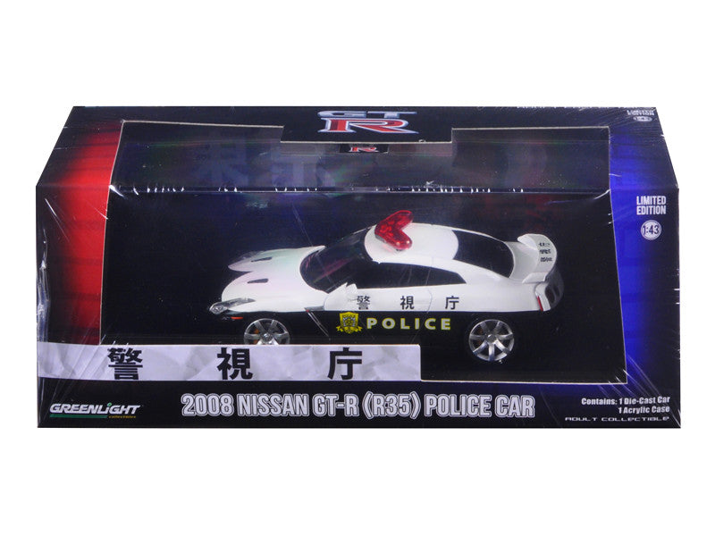 Greenlight 1:43 diecast 2015 Nissan GT-R R35 Police Car with detailed design, rubber tires, and display case