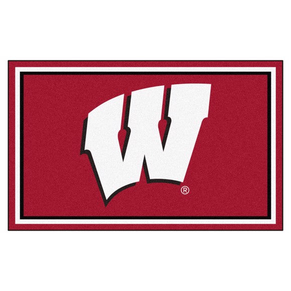 Wisconsin Badgers NCAA 4ft. x 6ft. Plush Rug with team colors, 100% nylon face, and durable Duragon backing. Officially licensed.