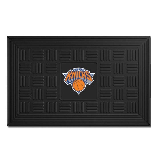 New York Knicks NBA Door Mat: 19.5" x 31", 3-D logo in team colors. Ridges clean shoes, drain water. Durable, weather-resistant vinyl.
