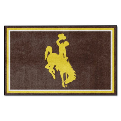 Wyoming Cowboys NCAA 4ft. x 6ft. Plush Rug with team colors, 100% nylon face, and durable Duragon backing. Officially licensed.