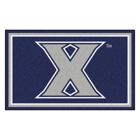 Xavier Musketeers NCAA 4ft. x 6ft. Plush Rug featuring team graphics and colors, 100% nylon face, durable Duragon backing.