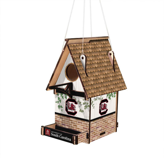 Show your team loyalty and your love of birds with the stylish South Carolina Gamecocks Wood Birdhouse. Expertly crafted in the USA, this birdhouse is cut and printed on MDF for a long-lasting design. The bold team graphics and colors are the perfect way to show off your spirit.