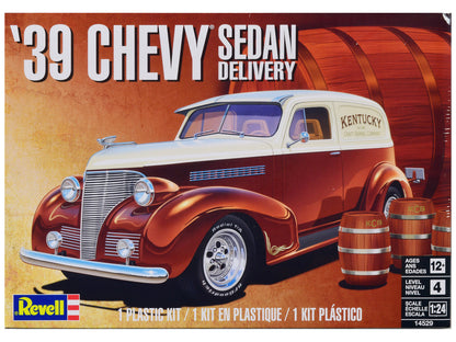 Revell's 1939 Chevrolet Sedan Delivery Model Kit: Skill Level 4, includes barrel accessories. Colorful decals, vintage packaging.