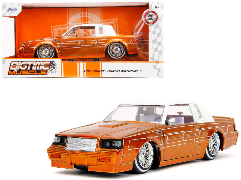 1987 Buick Grand National diecast, orange metallic with white top, 1/24 scale, detailed, opening parts, Bigtime Muscle series, new box.