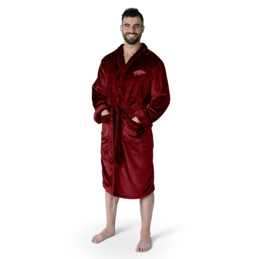 Arkansas Razorbacks bathrobe with silky-soft fabric, embroidered logo, tie belt, and pockets. Officially licensed NCAA product.