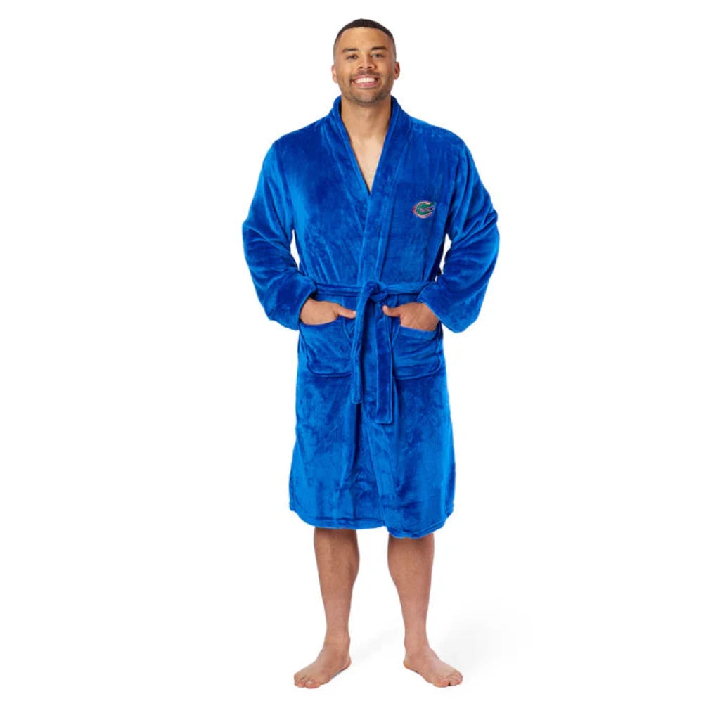 Florida Gators bathrobe with silky-soft fabric, embroidered logo, tie belt, and pockets. Officially licensed NCAA product.