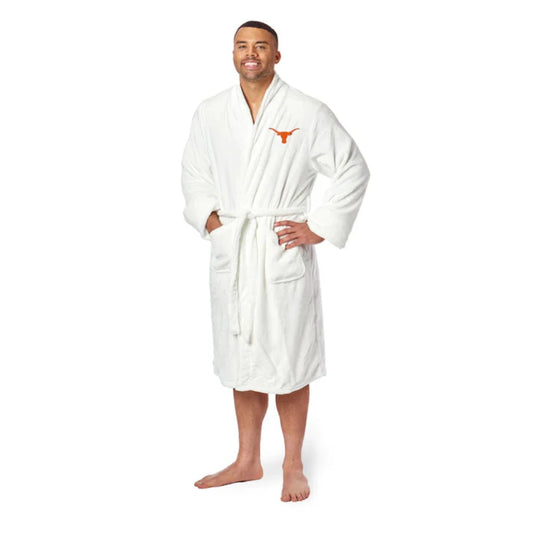 Texas Longhorns bathrobe with silky-soft fabric, embroidered logo, tie belt, and pockets. Officially licensed NCAA product.