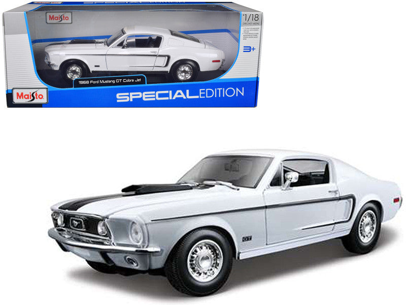 1/18 scale diecast model of a 1968 Ford Mustang CJ Cobra Jet in white by Maisto, with opening features and detailed interior.