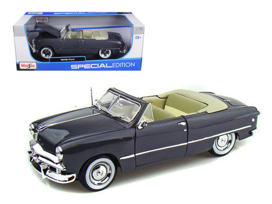 Maisto 1/18 Diecast 1949 Ford Convertible in Gray. New in box, steerable wheels, opening features, detailed interior/exterior. L-10.5, W-4.5, H-3.5 inches.