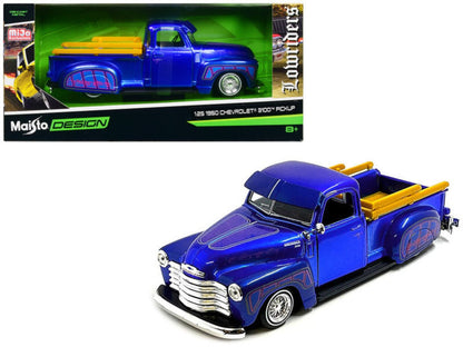 Maisto 1950 Chevy 3100 Lowrider, candy blue with graphics, 1/25 scale diecast. Real rubber tires, opening doors & tailgate.