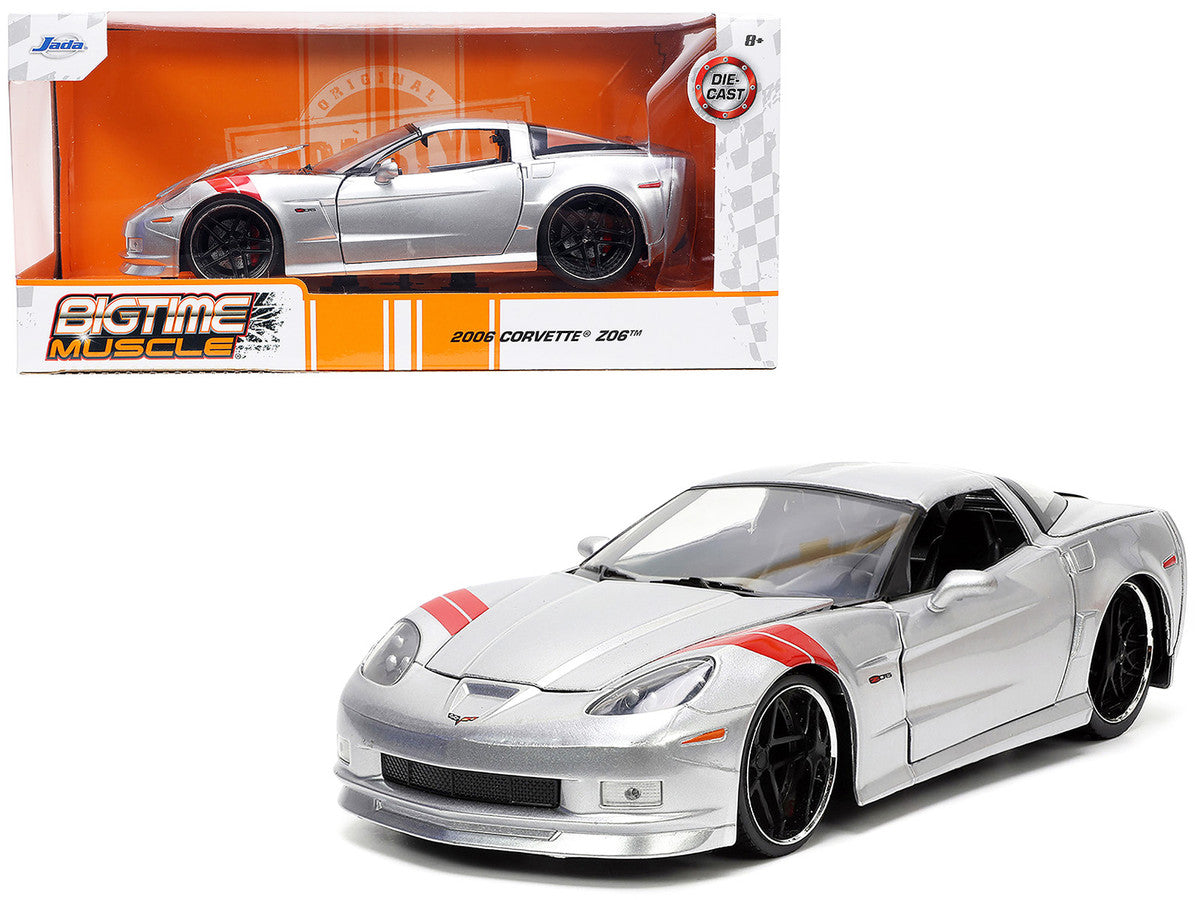 Jada 1/24 diecast 2006 Chevy Corvette Z06 in silver metallic with red stripes and opening parts

