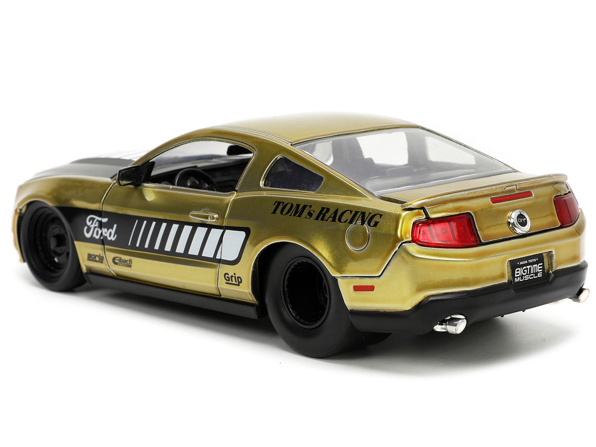 2010 Ford Mustang GT Gold Metallic with Black Graphics and Hood "Tom's Racing" "Bigtime Muscle" Series 1/24 Diecast Model Car by Jada