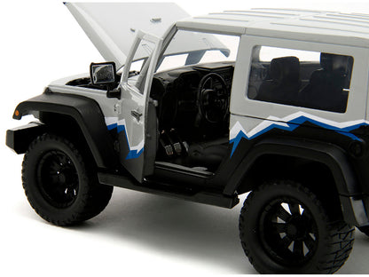 2007 Jeep Wrangler Gray and Black with Blue and White Stripes with Extra Wheels "Just Trucks" Series 1/24 Diecast Model Car by Jada