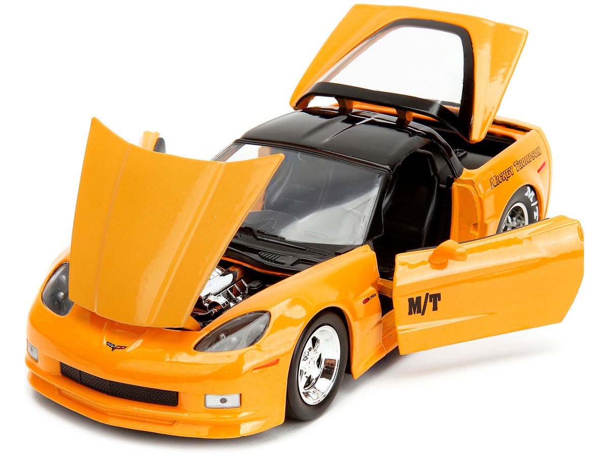 2006 Chevrolet Corvette Yellow with Black Top "Mickey Thompson" "Bigtime Muscle" Series 1/24 Diecast Model Car by Jada