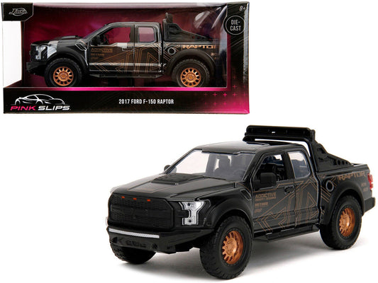2017 Ford F-150 Raptor Pickup Truck Black with Gold Graphics "Pink Slips" Series 1/24 Diecast Model Car by Jada