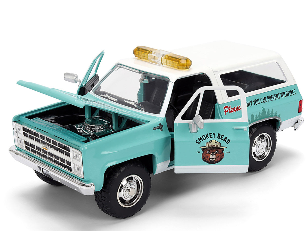 1980 Chevrolet Blazer Light Green with White Top and Graphics and Smokey Bear Diecast Figure 1/24 Diecast Model by Jada
