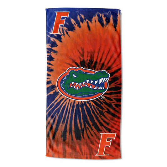 Bold Florida Gators tie-dye towel, 30x60 inches, with team logo. Soft and lightweight cotton-poly, ideal for beach days