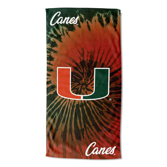 Miami Hurricanes tie-dye beach towel, 30x60 inches, with team logo. Soft, lightweight cotton-poly blend for pool or beach.