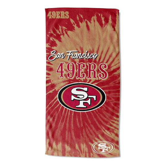 Vibrant tie-dye beach towel showcasing San Francisco 49ers logo. Soft, lightweight, 30"x60" cotton-poly blend. Official NFL licensed by The Northwest