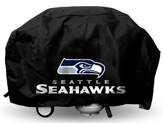 Seattle Seahawks Deluxe Vinyl Grill Cover with straps, felt lining, and bold team logo. Fits most standard grills.