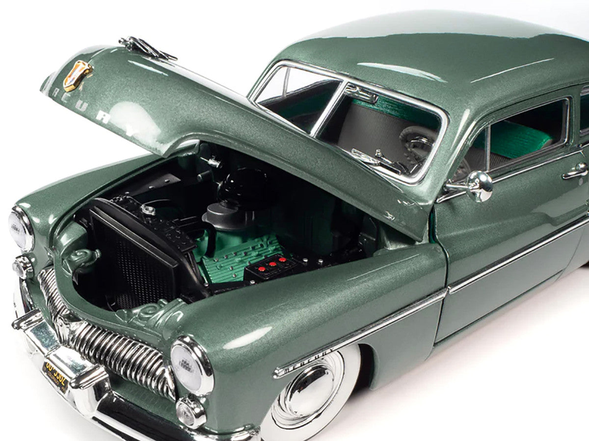 Engine of Auto World 1949 Mercury Eight Coupe 1/18 diecast model. Brand new, limited edition, with real rubber tires, detailed interior, and officially licensed.