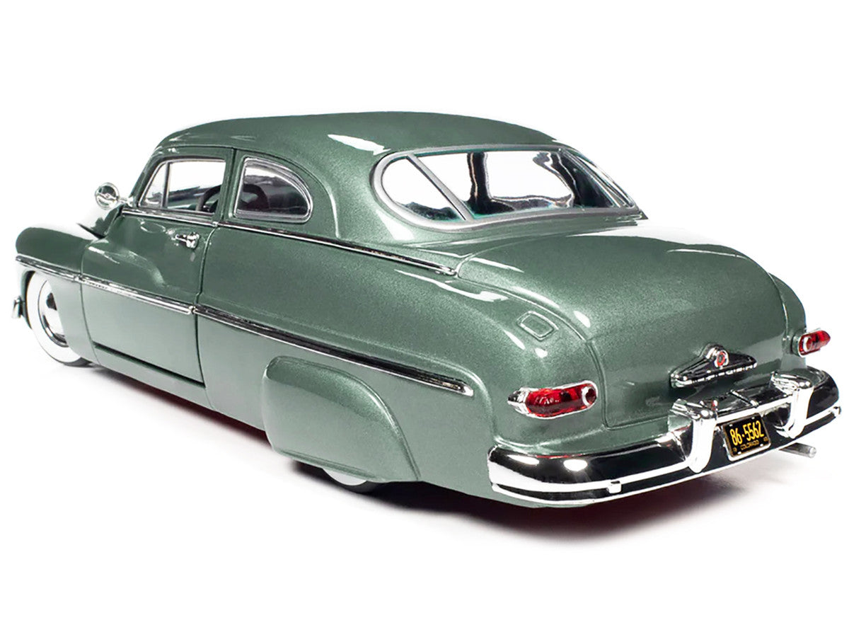 rear view of Auto World 1949 Mercury Eight Coupe 1/18 diecast model. New, limited edition, featuring real rubber tires, detailed interior, and officially licensed.