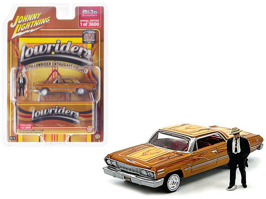 1963 Chevrolet Impala Lowrider Orange with Graphics and Diecast Figure Limited Edition to 3600 pieces Worldwide 1/64 Diecast Car by Johnny Lightning