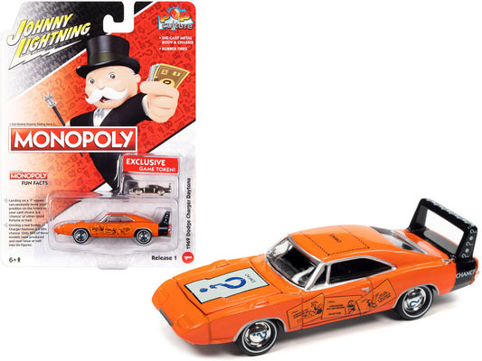 1969 Dodge Charger Daytona Orange with Black Tail Stripe and Graphics with Game Token "Monopoly" "Pop Culture" 2022 Release 1 1/64 Diecast Model Car