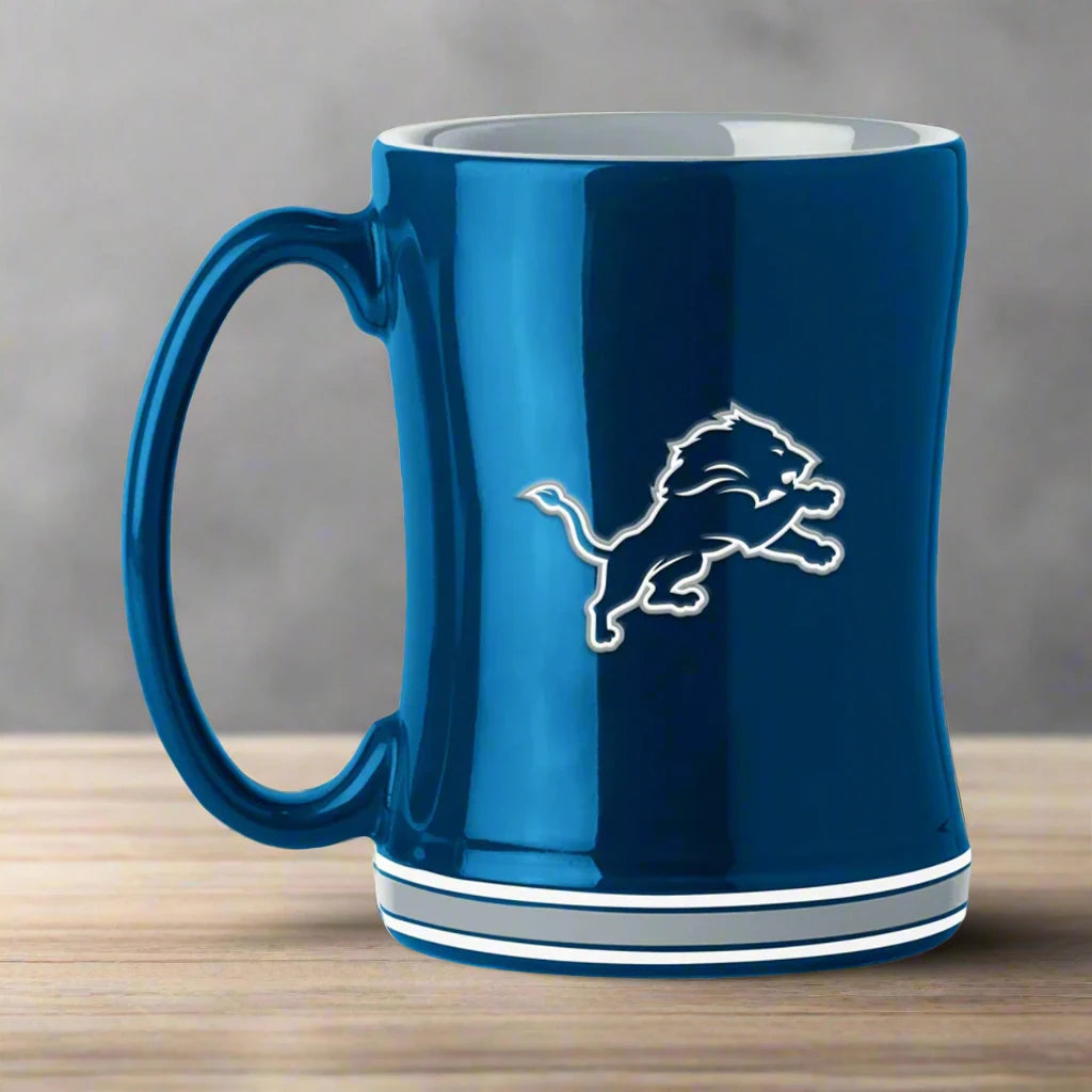 Detroit Lions 14 oz. NFL Ceramic Coffee Mug with 3D logo, team colors, and name on handle. Microwave and dishwasher safe