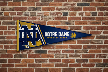 Notre Dame Fighting Irish 12x30 NCAA felt pennant on brick wall