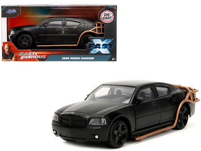 Jada 1/32 2006 Dodge Charger Matte Black with Outer Cage from Fast & Furious Series, diecast model with opening doors.