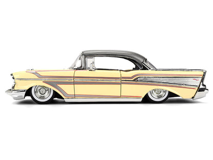 Model of a classic yellow car with chrome details - side view