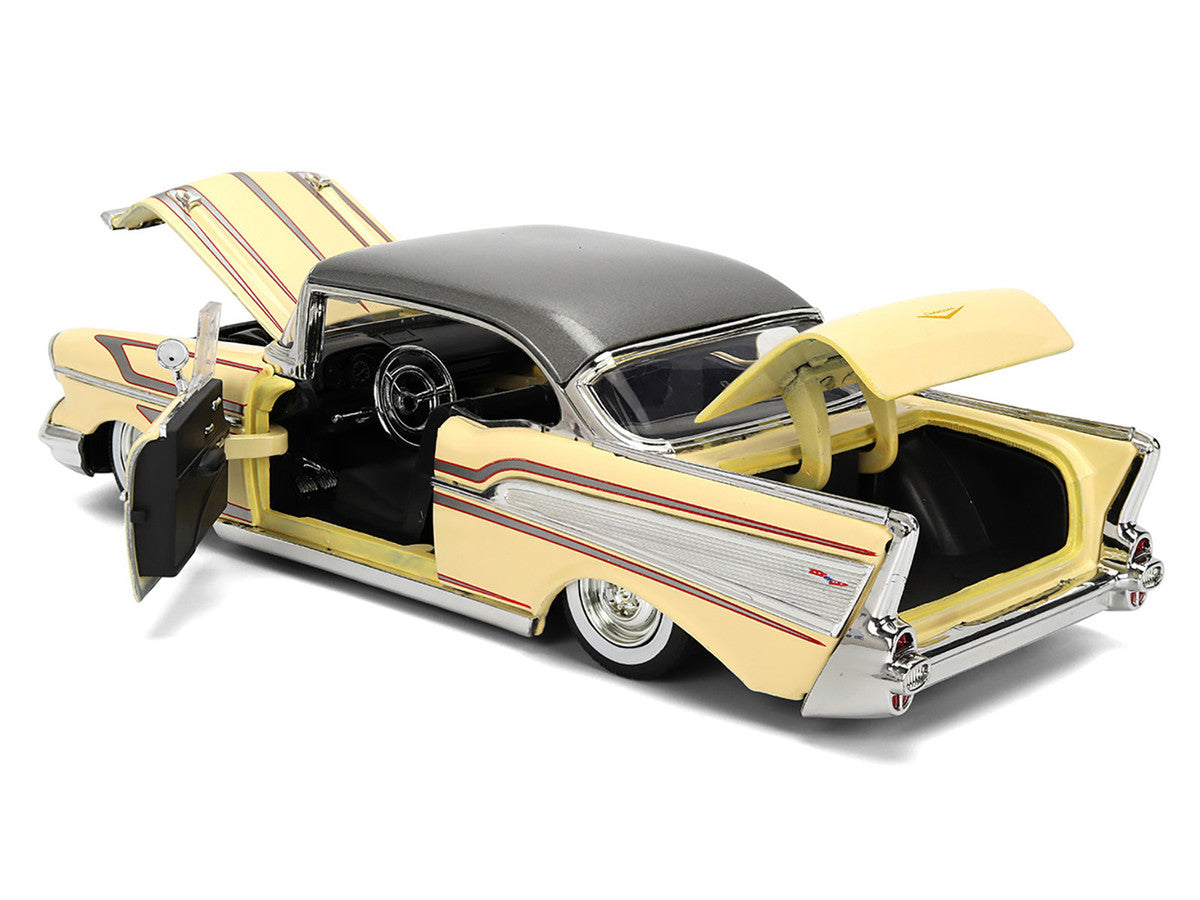 Model car with open doors on a white background - backend view