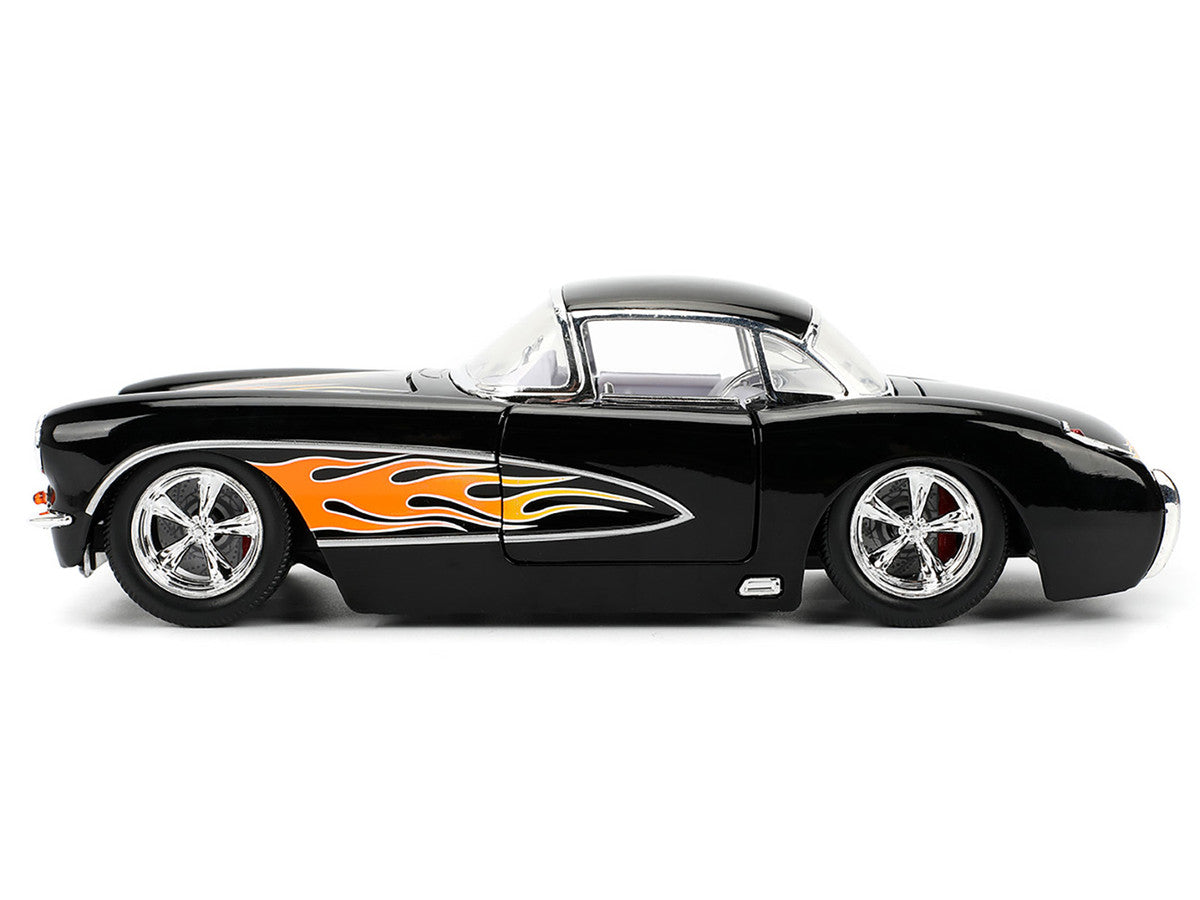 Black model car with orange flames  - side view