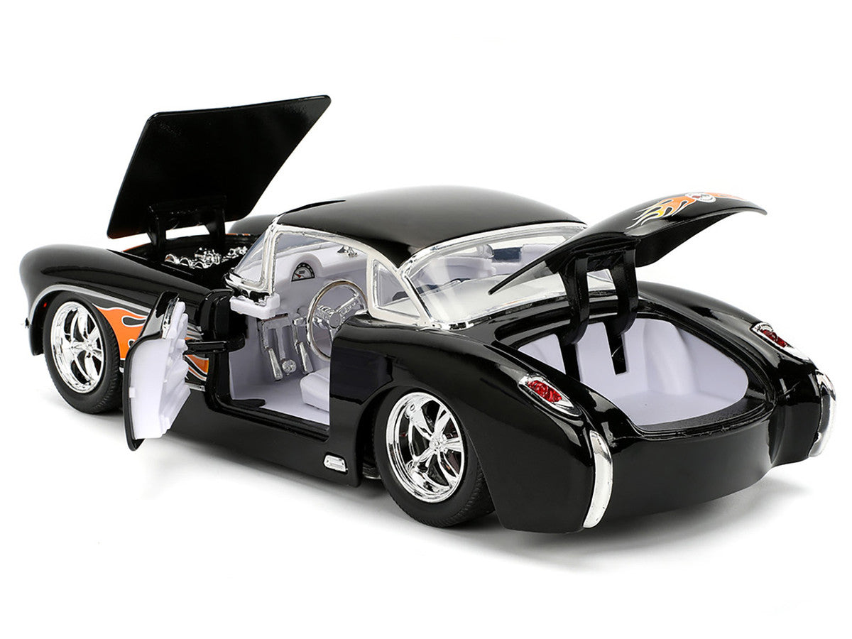 Black toy car with open doors, hood and trunk - rear view