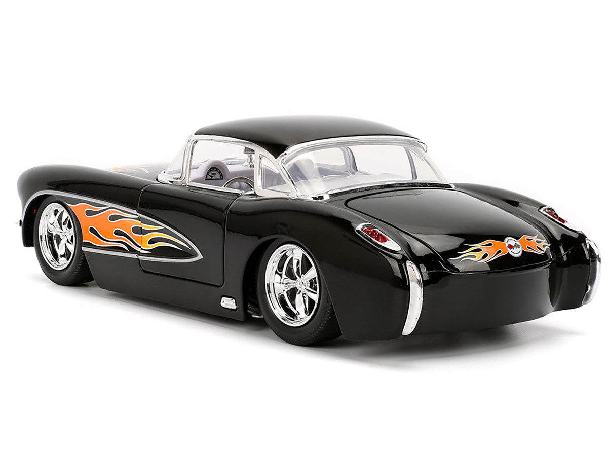 Black model car with orange flames - rear view