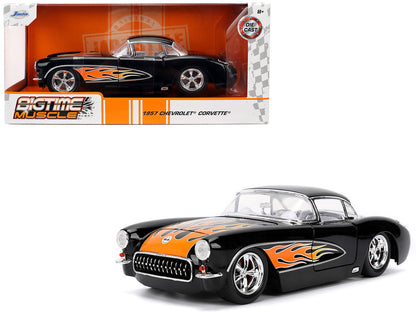 Jada 1/24 scale 1957 Chevy Corvette diecast in black with flame graphics, opening parts, and white interior

