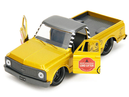 Yellow toy truck with open doors - view from the front