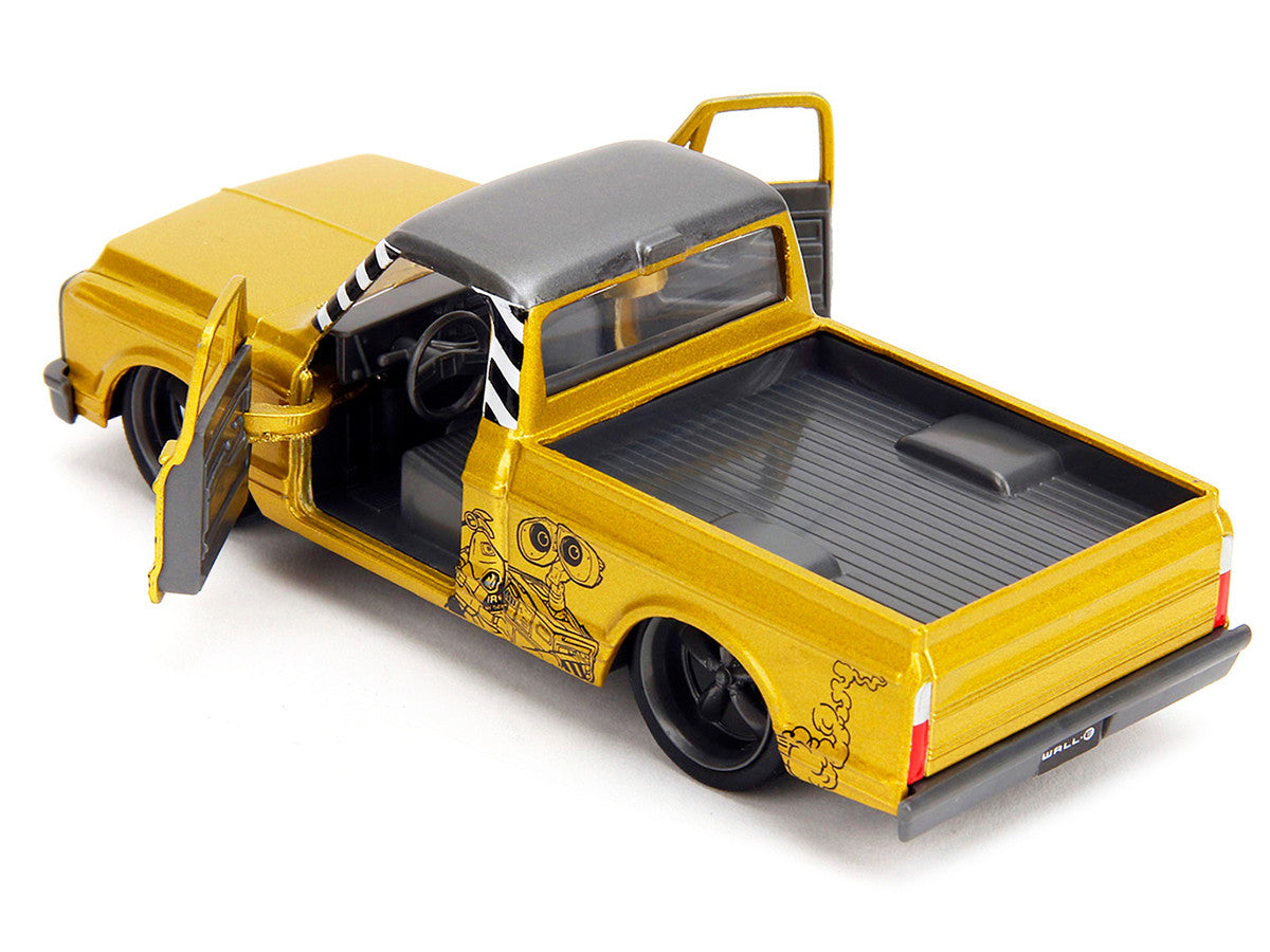Yellow model truck with open doors -view from the back