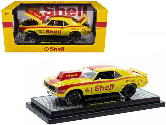 Limited edition M2 Machines 1969 Chevrolet Camaro SS/RS diecast in Shell Oil yellow with red stripes, 1/24 scale.