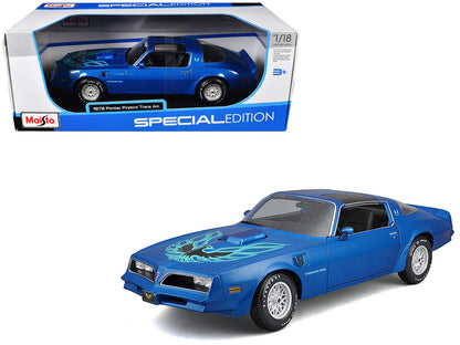 Maisto 1978 Pontiac Firebird Trans Am 1/18 diecast model in blue metallic with hood graphics and opening parts.
