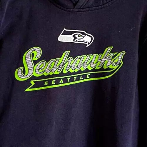 Seattle Seahawks Preowned Boys Hoodie, XL (18-20). Armpit to Armpit: 21", Collar to Tail: 21", Sleeve: 19". 70% Cotton, 30% Polyester. Officially licensed.