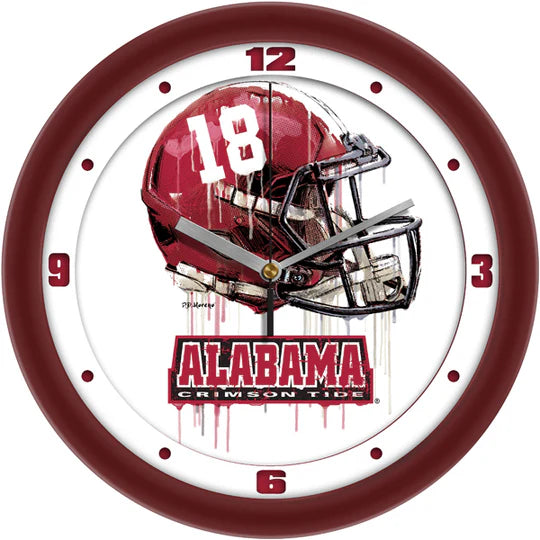 Alabama Crimson Tide Drip Helmet Wall Clock, 11.5" diameter, silent running with team colors and art by P. D. Moreno. Durable plastic frame, mineral glass window. Officially licensed by NCAA. Made by Suntime.