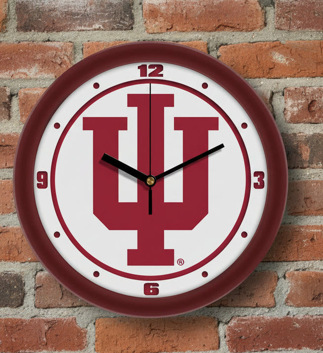 Wall clock with Indiana University logo on brick wall