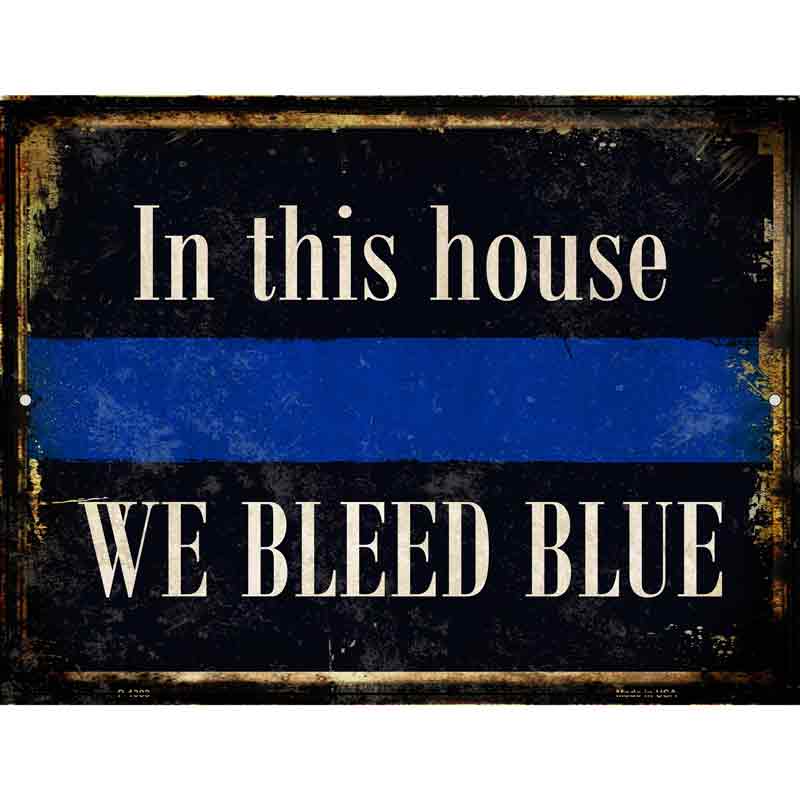 Decorative sign with text 'In this house WE BLEED BLUE' on a dark background