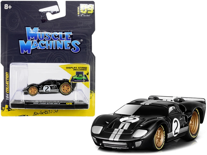 Muscle Machines 1966 Ford GT40 MKII #2 diecast model car in black with silver stripes and gold wheels, 1/64 scale, featuring a detailed exterior and real rubber tires.