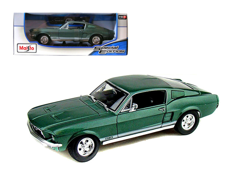 Maisto 1/18 scale 1967 Ford Mustang Fastback GTA diecast model in green, featuring opening hood, doors, and trunk.